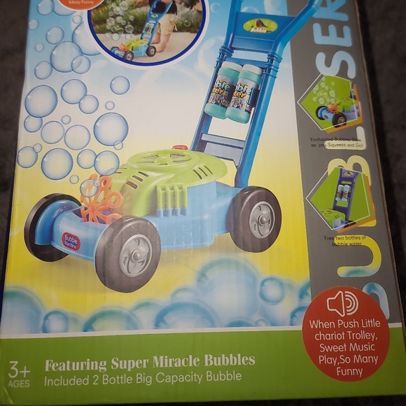 Kids Push Bubble lawn mower  that creates bubbles and plays music as you push - Picture 2 of 3